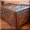 F44. Carved camphor wood trunk. 19"h x 36"w x 19"d 